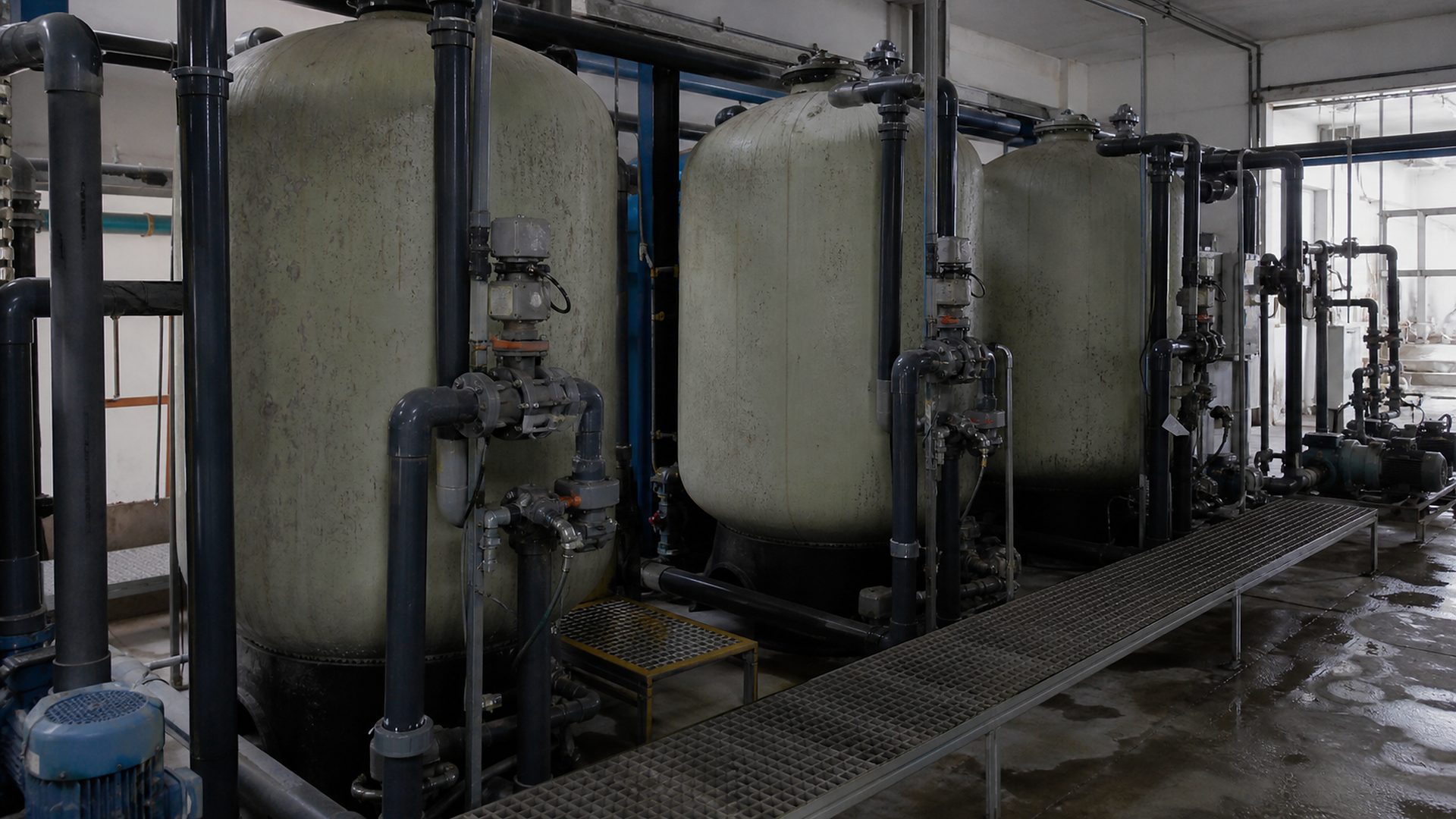 Activated carbon water treatment system atmosphere with filtration tanks and piping
