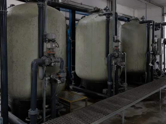 Activated carbon filtration vessels and piping in a water-treatment system