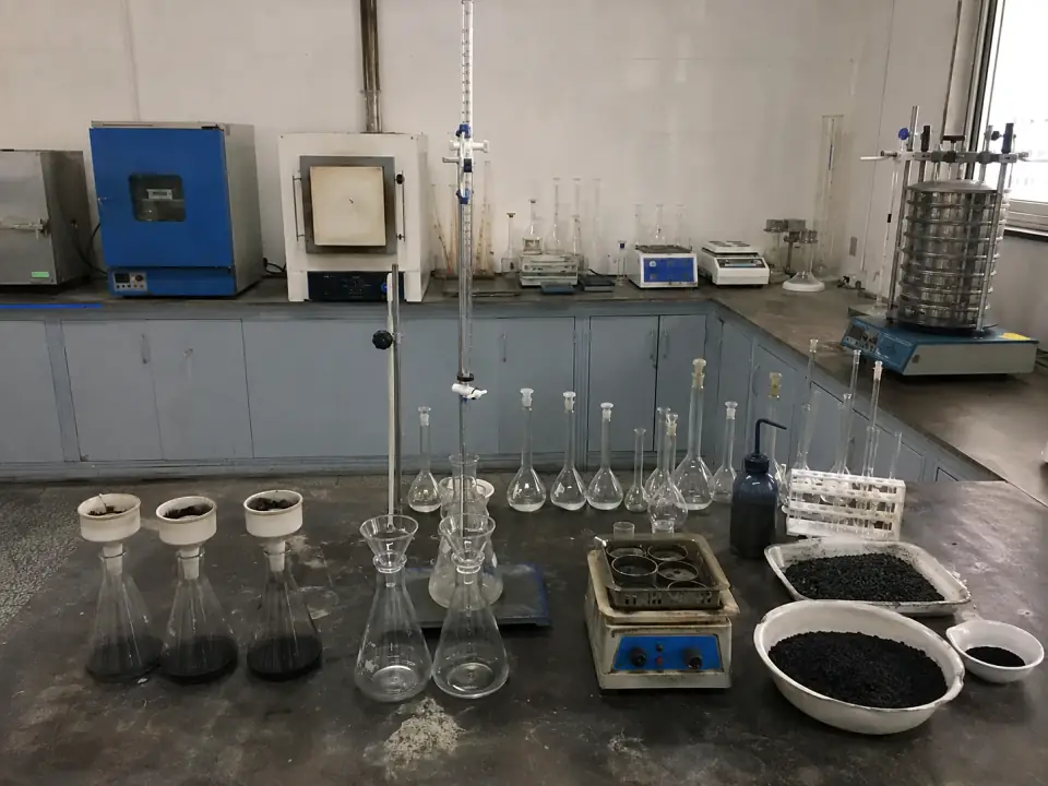 ASTM D4607 iodine number titration and glassware in the factory laboratory